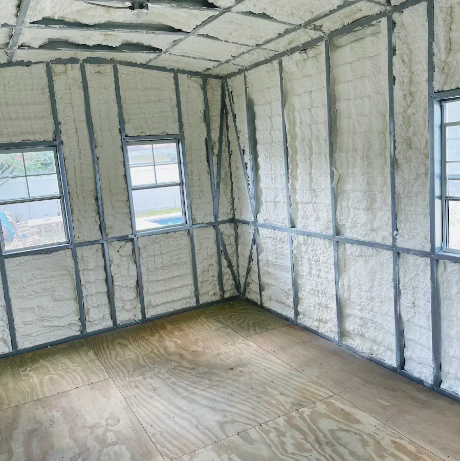 Closed-cell spray foam insulation applied to wall cavities in a residential project in Marion